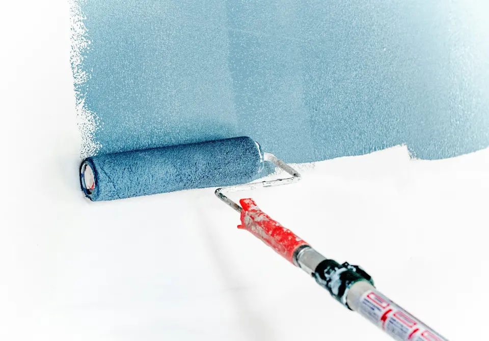 Paint roller refreshing a wall